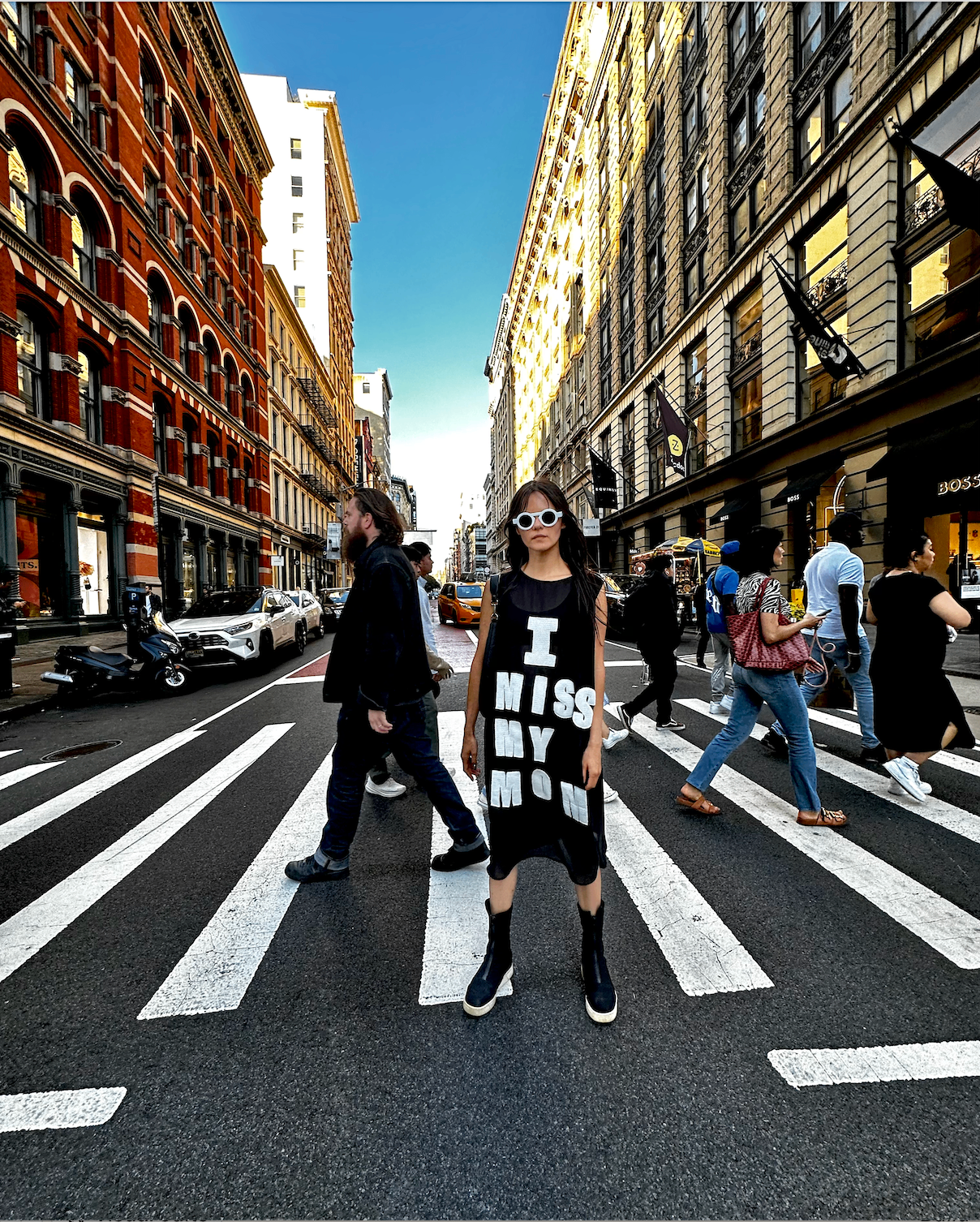 Woman wearing the I Miss My Mom dress crossing a SoHo street